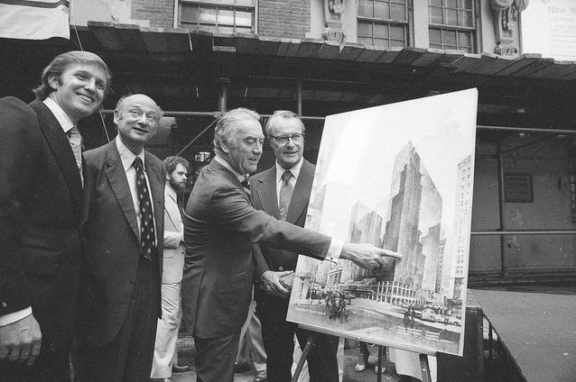 Donald Trump and Mayor Ed Koch pointing at a rendering of the New York Hyatt Hotel, which received a 40-year tax break costing the city $360 million
